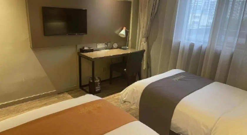 Bed in Home Inn Plus Shanghai Zhangjiang Guanglan Road Metro Station