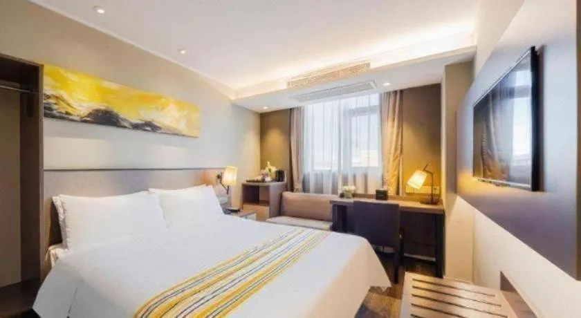 Bed in Home Inn Plus Shanghai Zhangjiang Guanglan Road Metro Station