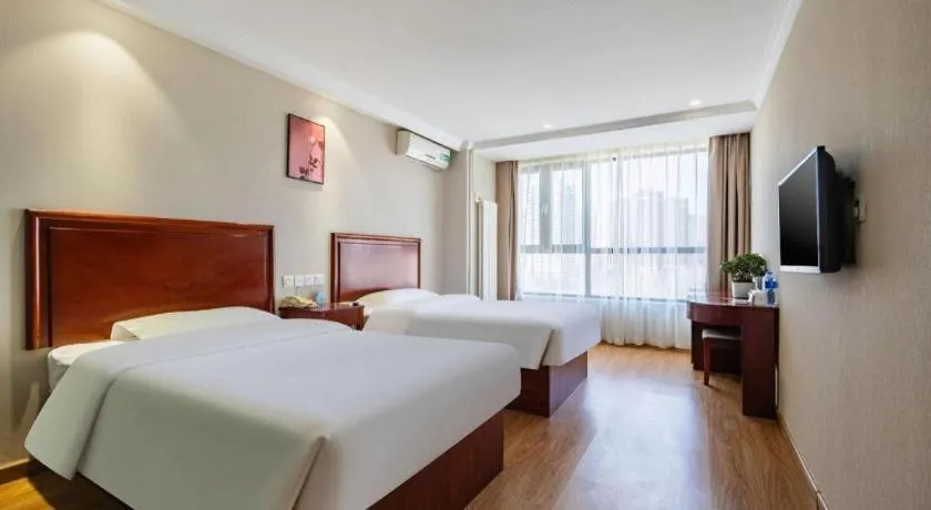Bed in GreenTree Inn Tianjin JinNan ShuangLin Metro Station Express Hotel
