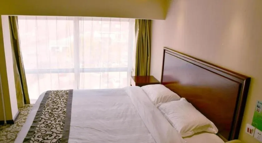 Bed in GreenTree Inn Tianjin JinNan ShuangLin Metro Station Express Hotel