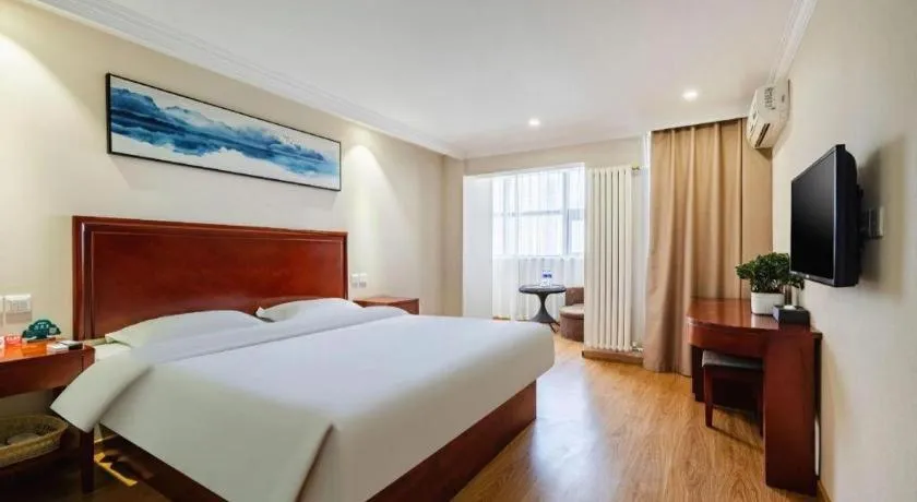 Bed in GreenTree Inn Tianjin JinNan ShuangLin Metro Station Express Hotel