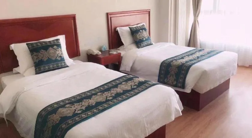 Bed in GreenTree Inn Tianjin JinNan ShuangLin Metro Station Express Hotel