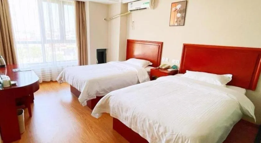 Bed in GreenTree Inn Tianjin JinNan ShuangLin Metro Station Express Hotel