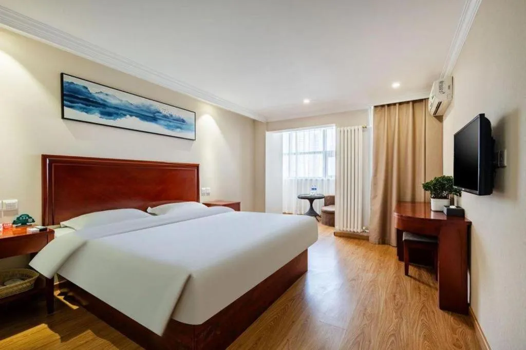 Bed in GreenTree Inn Tianjin JinNan ShuangLin Metro Station Express Hotel