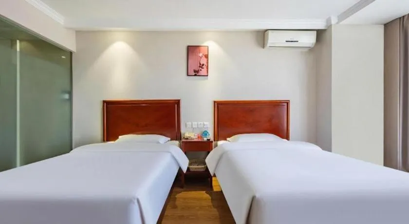 Bed in GreenTree Inn Tianjin JinNan ShuangLin Metro Station Express Hotel