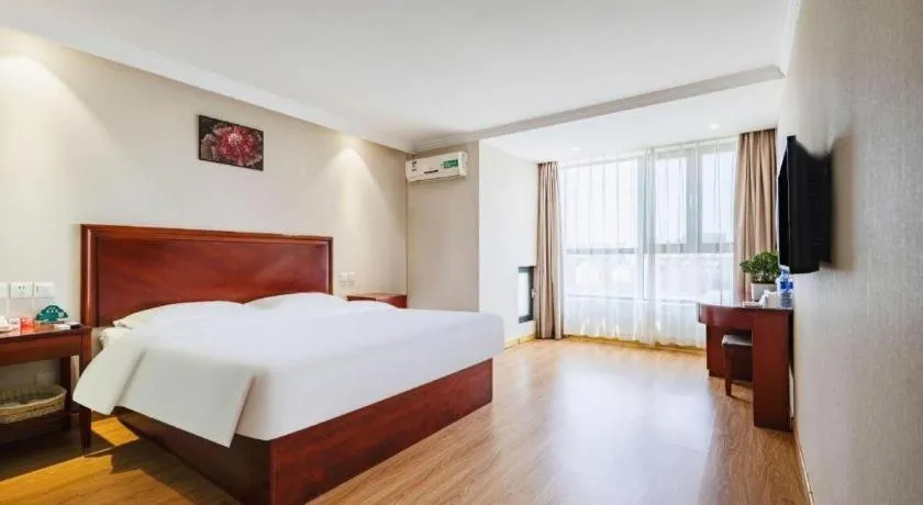 Bed in GreenTree Inn Tianjin JinNan ShuangLin Metro Station Express Hotel