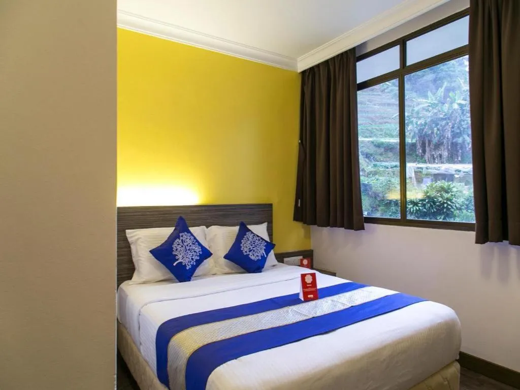 Bed in OYO 229 Parkland Hotel