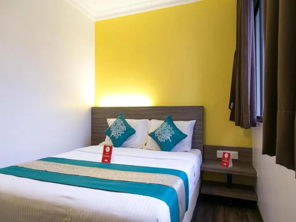 Bed in OYO 229 Parkland Hotel