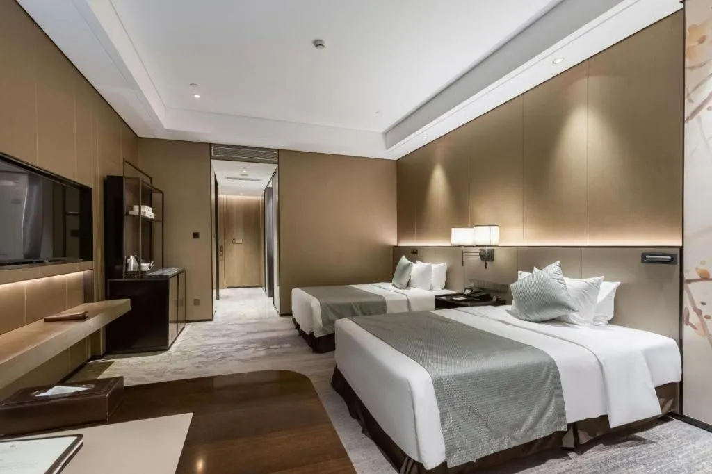 Bed in Golden Eagle Summit Hotel Kunshan