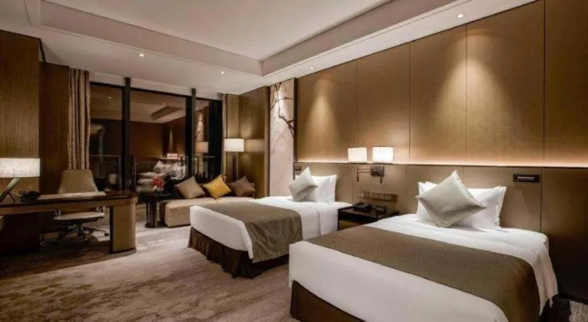 Bed in Golden Eagle Summit Hotel Kunshan