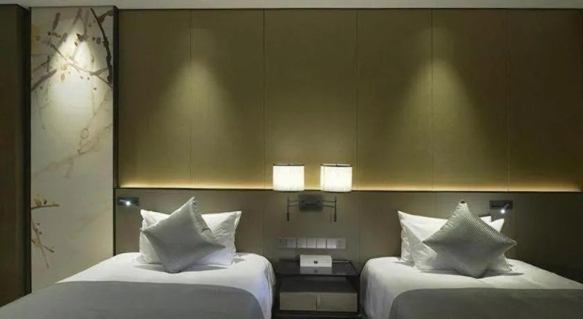 Bed in Golden Eagle Summit Hotel Kunshan