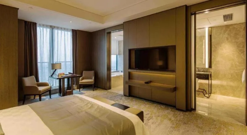 Bed in Golden Eagle Summit Hotel Kunshan