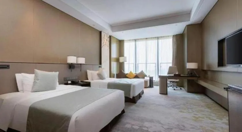 Bed in Golden Eagle Summit Hotel Kunshan