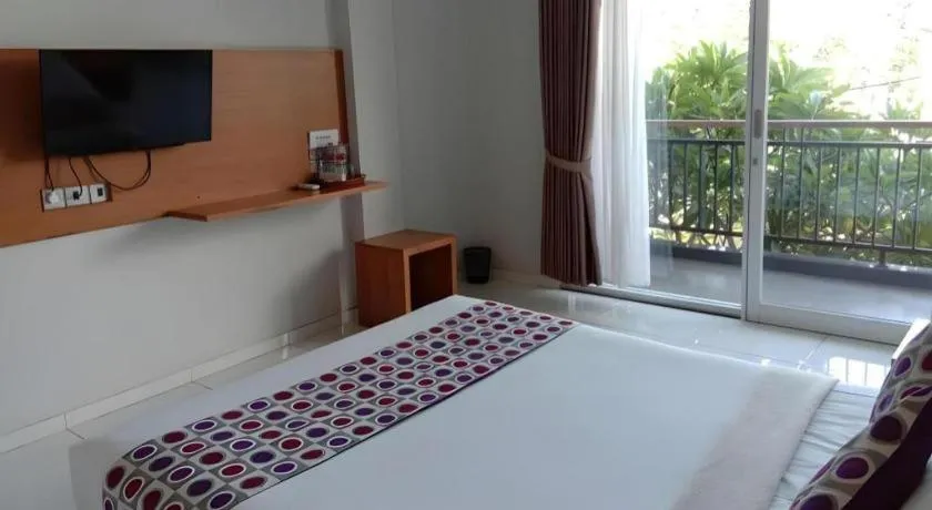 Bed in MANDARI HOTEL SINGARAJA