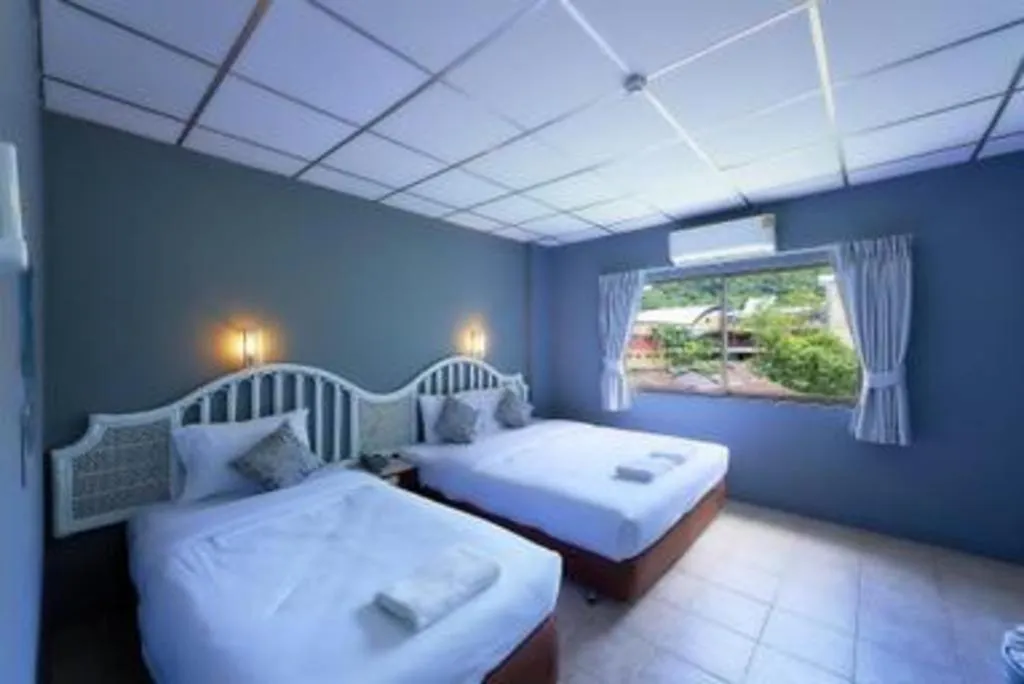 Bed in Nora Bukit Hotel