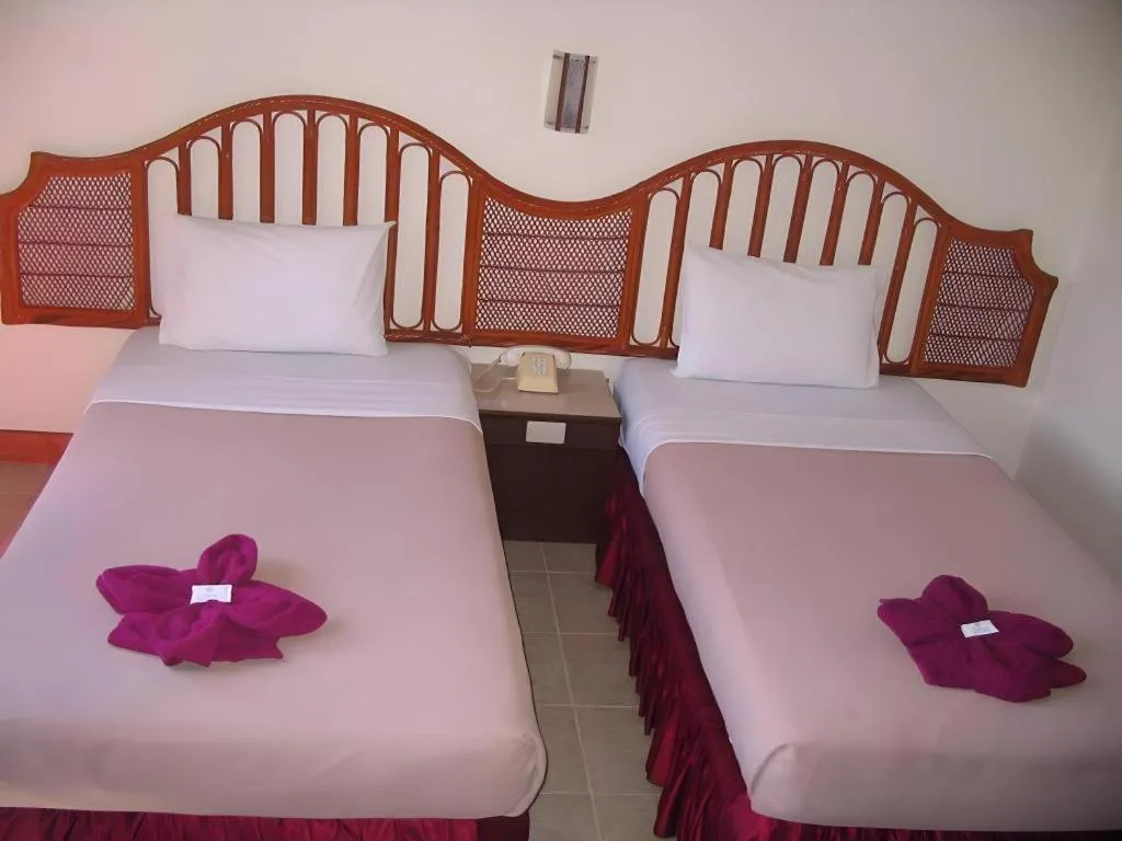 Bed in Nora Bukit Hotel