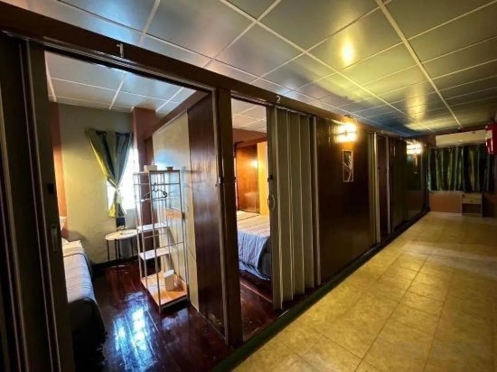 Bed in Nora Bukit Hotel