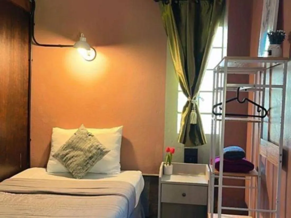 Bed in Nora Bukit Hotel