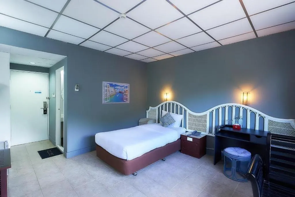 Bed in Nora Bukit Hotel