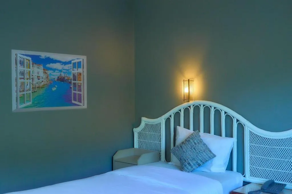 Bed in Nora Bukit Hotel