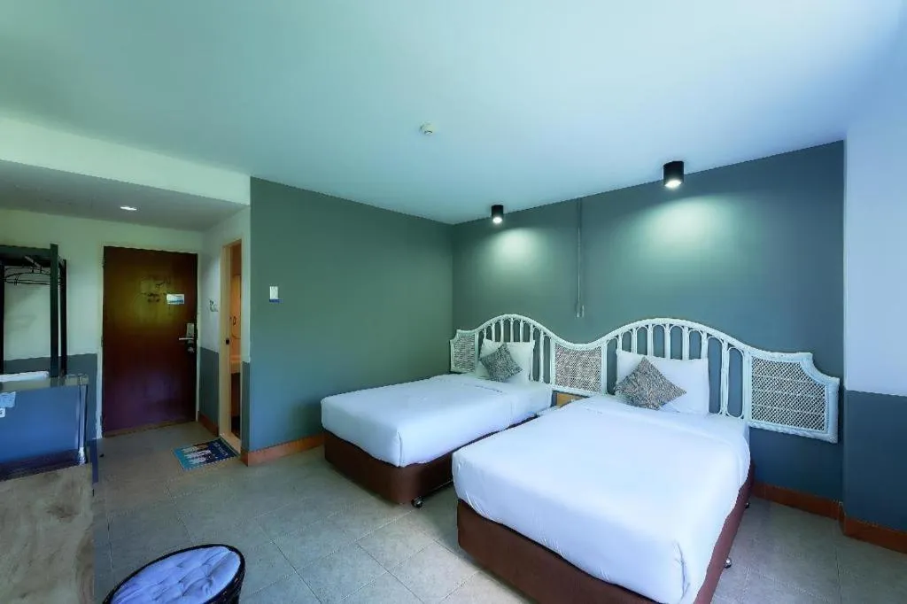 Bed in Nora Bukit Hotel