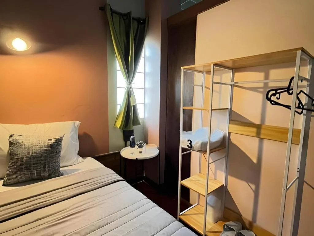 Bed in Nora Bukit Hotel