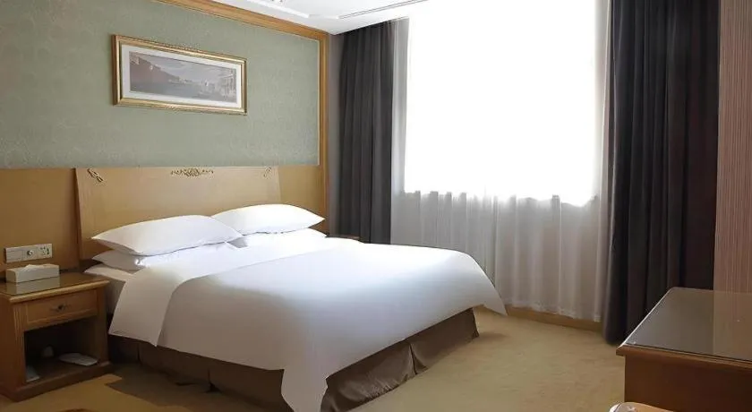 Bed in Vienna Classic Hotel Suzhou Likou Furniture Market Metro Station