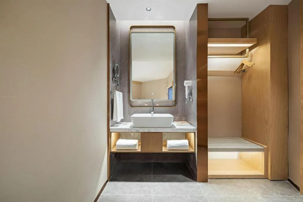 Bed in Vienna Classic Hotel Suzhou Likou Furniture Market Metro Station