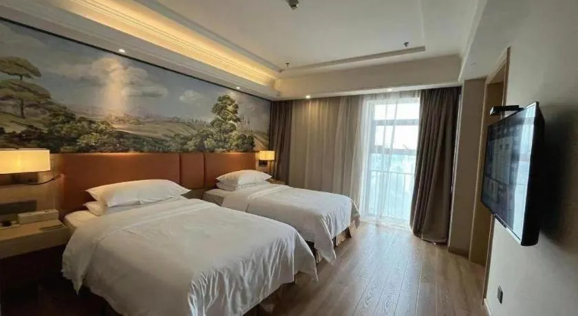 Bed in Vienna Hotel Jiangsu Danyang Railway Station