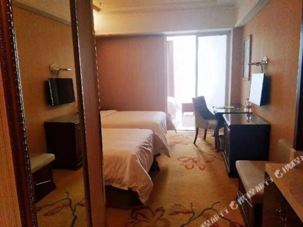 Bed in Vienna Hotel Jiangsu Danyang Railway Station