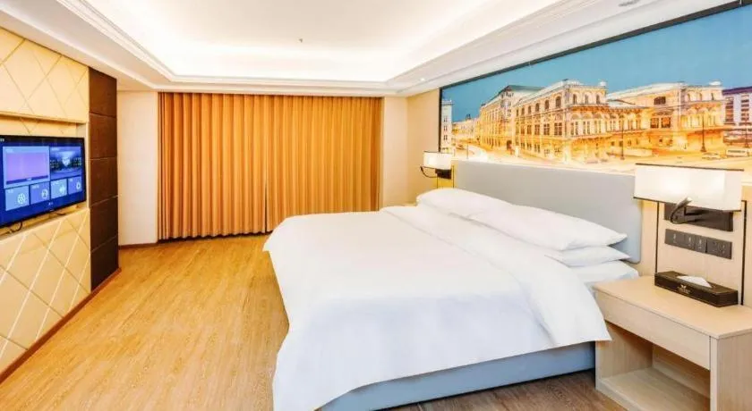 Bed in Vienna Hotel Yangzhou Outlets Plaza He Garden