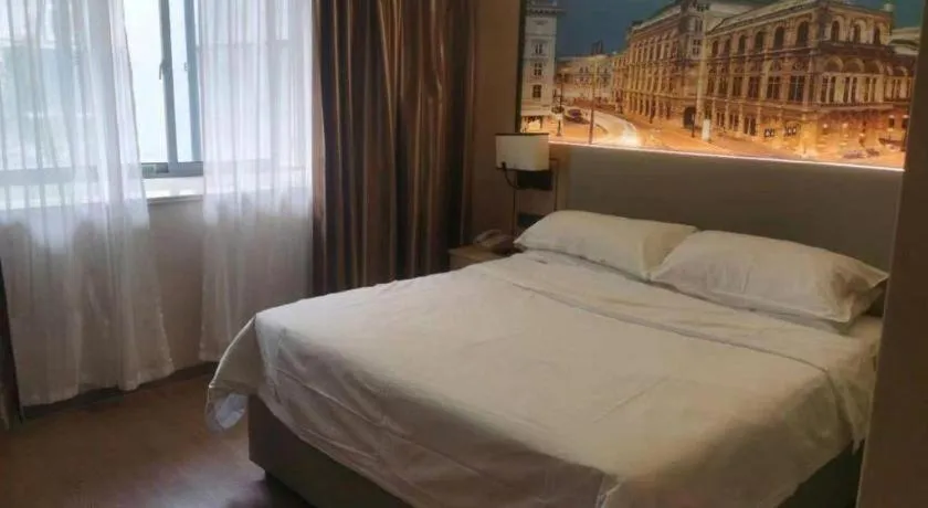 Bed in Vienna Hotel Yangzhou Outlets Plaza He Garden