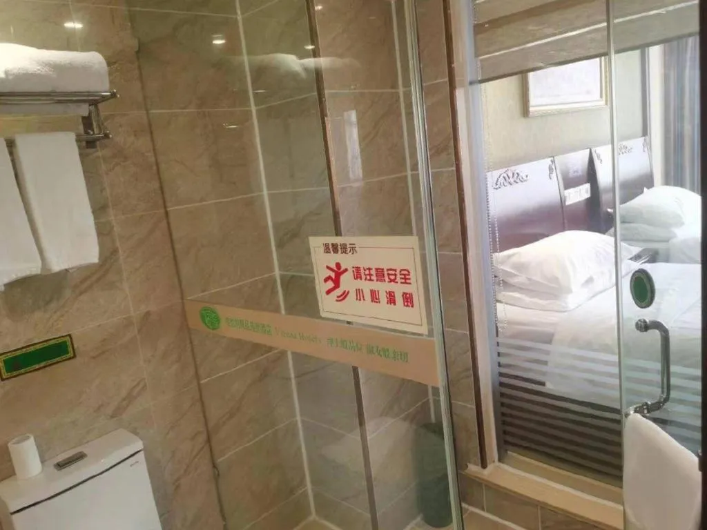 Bed in Vienna Hotel Yangzhou Outlets Plaza He Garden