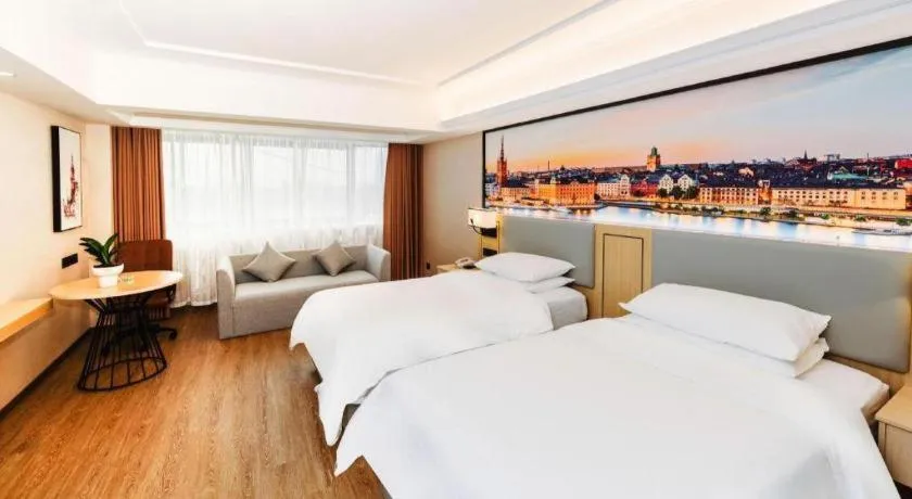 Bed in Vienna Hotel Yangzhou Outlets Plaza He Garden