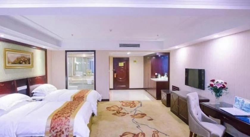Bed in Vienna Hotel Yangzhou Outlets Plaza He Garden