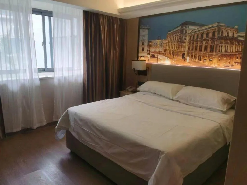 Bed in Vienna Hotel Yangzhou Outlets Plaza He Garden