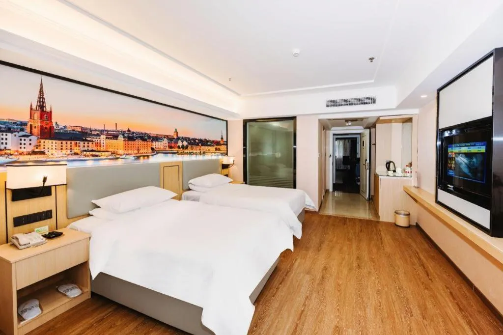 Bed in Vienna Hotel Yangzhou Outlets Plaza He Garden