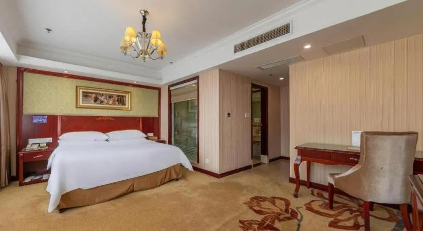 Bed in Vienna Hotel Yangzhou Outlets Plaza He Garden