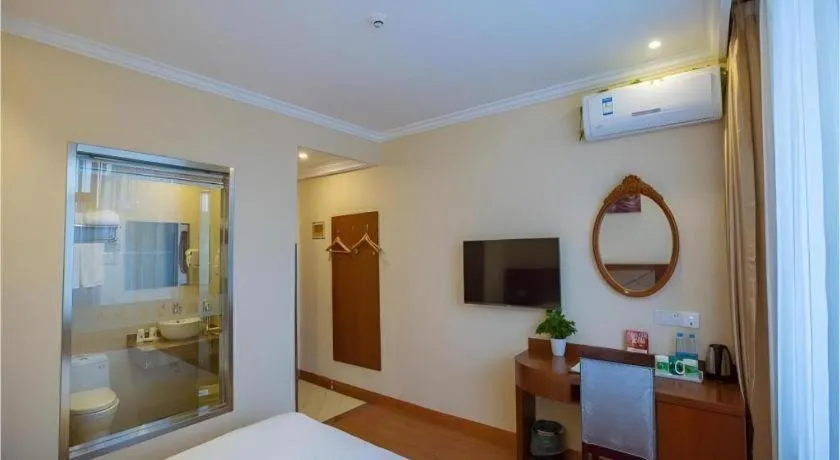 Bed in GreenTree Inn Wuxi Donggang Town Donghutang Shell Hotel