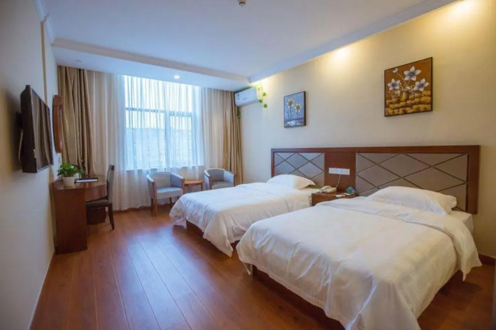 Bed in GreenTree Inn Wuxi Donggang Town Donghutang Shell Hotel