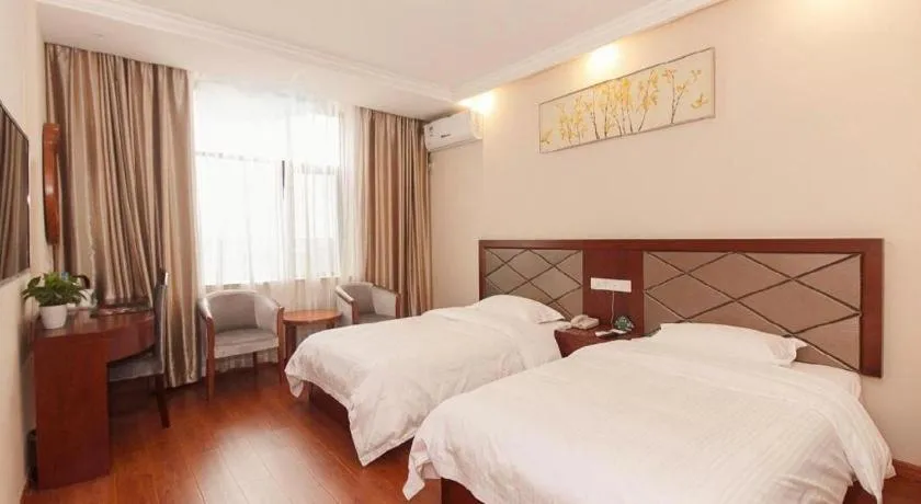 Bed in GreenTree Inn Wuxi Donggang Town Donghutang Shell Hotel