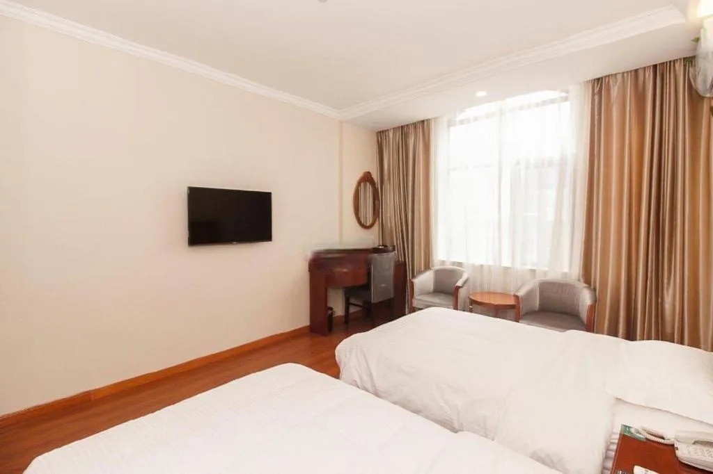 Bed in GreenTree Inn Wuxi Donggang Town Donghutang Shell Hotel