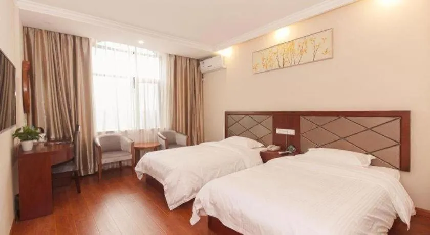 Bed in GreenTree Inn Wuxi Donggang Town Donghutang Shell Hotel