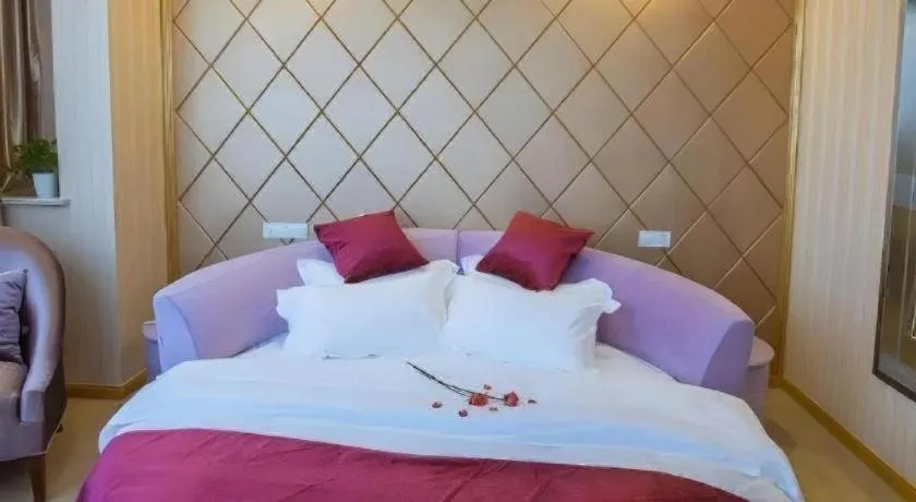 Bed in GreenTree Inn Wuxi Donggang Town Donghutang Shell Hotel