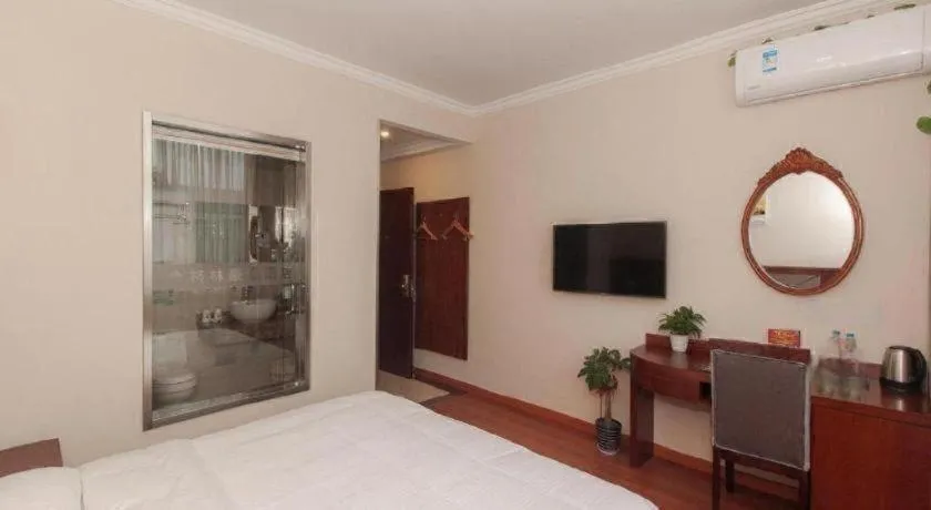 Bed in GreenTree Inn Wuxi Donggang Town Donghutang Shell Hotel