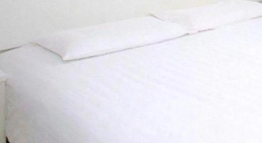 Bed in GreenTree Inn Wuxi Donggang Town Donghutang Shell Hotel