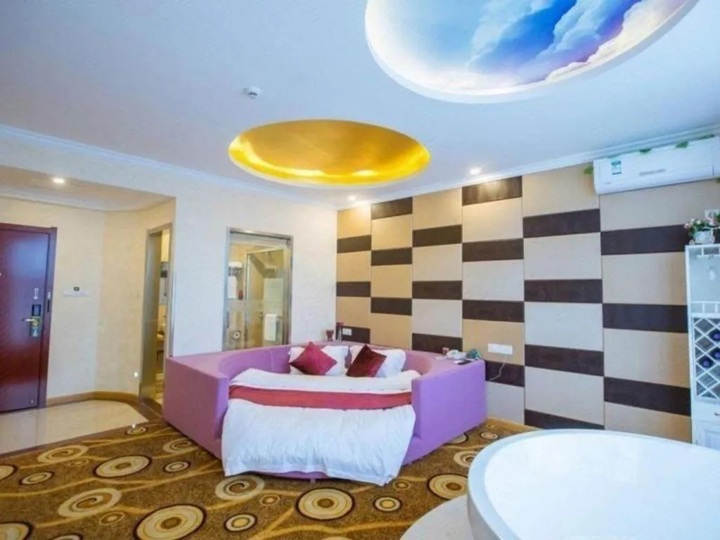 Bed in GreenTree Inn Wuxi Donggang Town Donghutang Shell Hotel