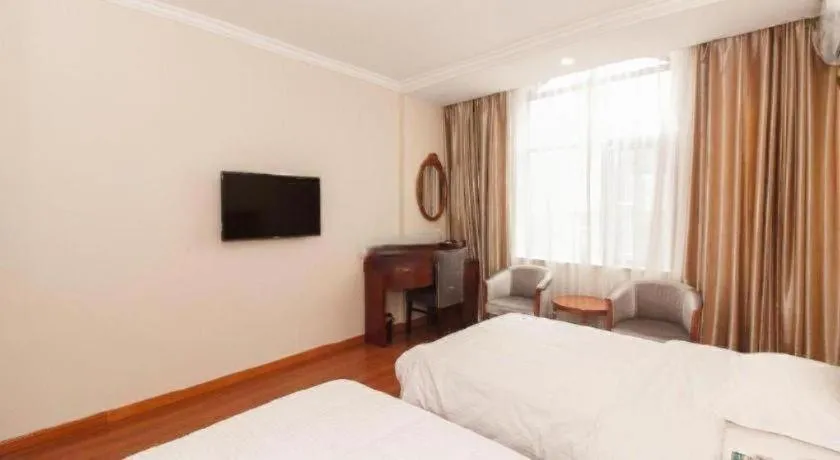 Bed in GreenTree Inn Wuxi Donggang Town Donghutang Shell Hotel