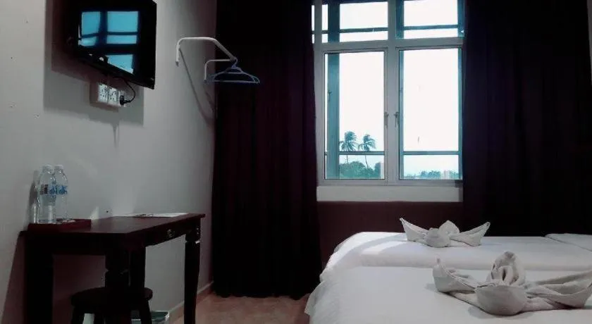 Bed in De Chukai Hotel