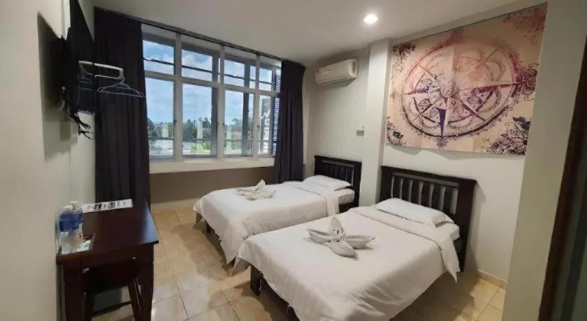 Bed in De Chukai Hotel